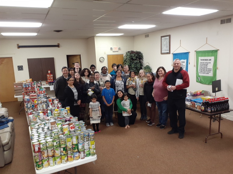 Collecting and filling Thanksgiving baskets for those in need.